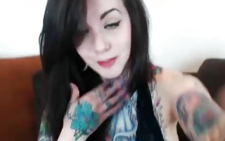 Hot utter personage tattooed lass exposing her dressy eyes on livecam